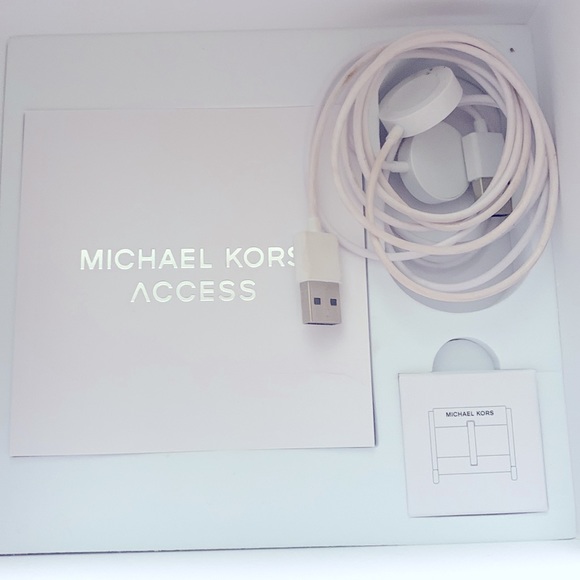 Michael Kors watch it comes with two bands and two chargers. - Picture 2 of 5